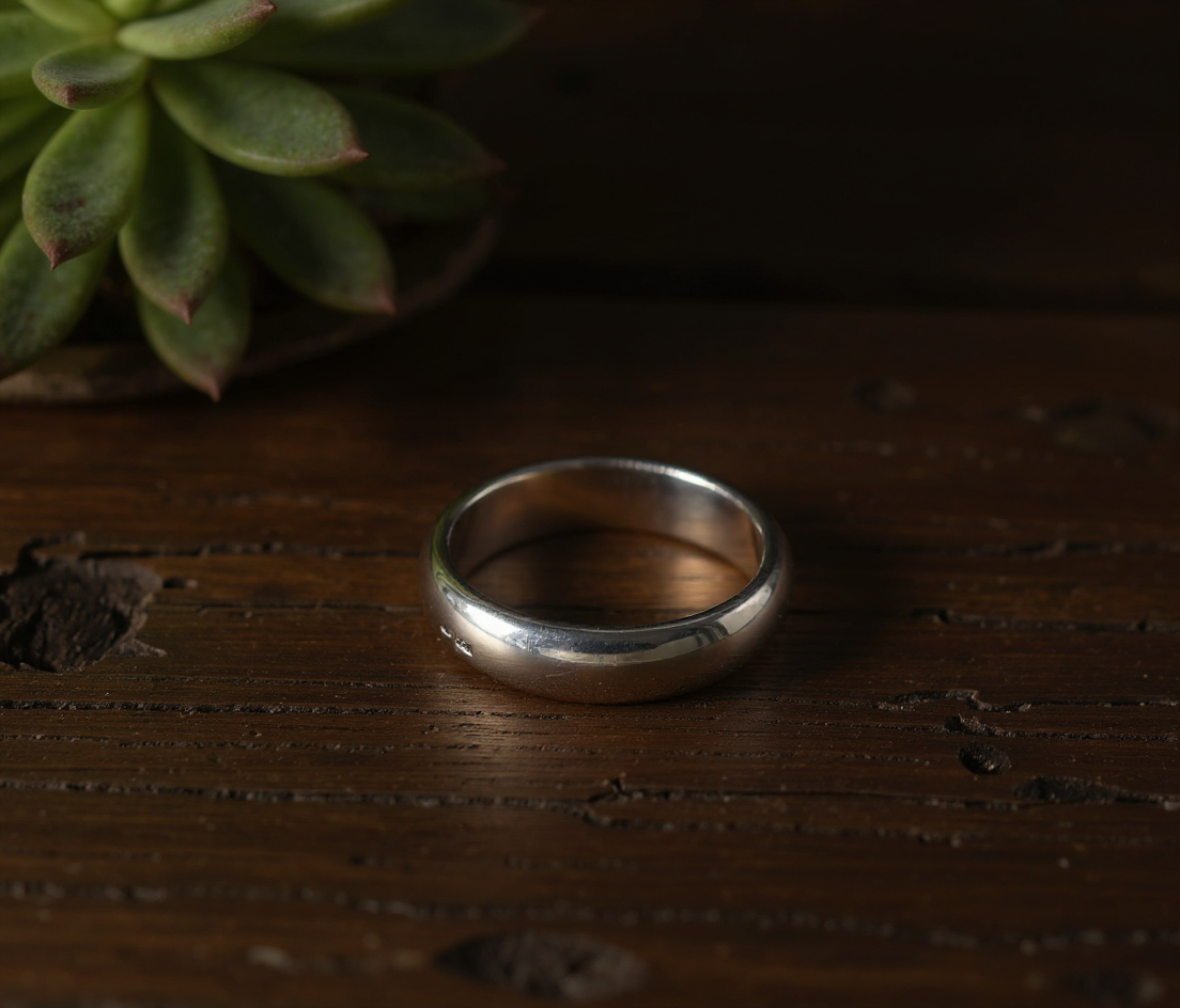 Jewelry photography of a ring on a prop